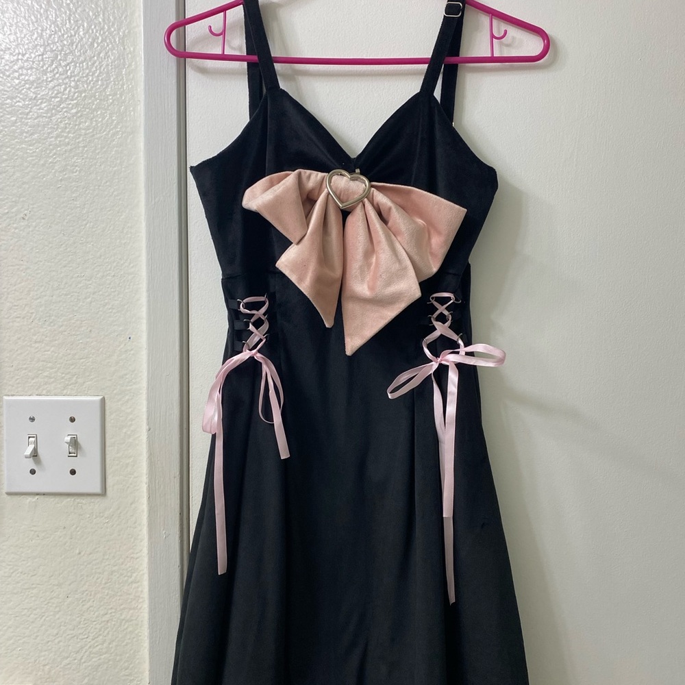 cute black soft dress with pastel pink bows